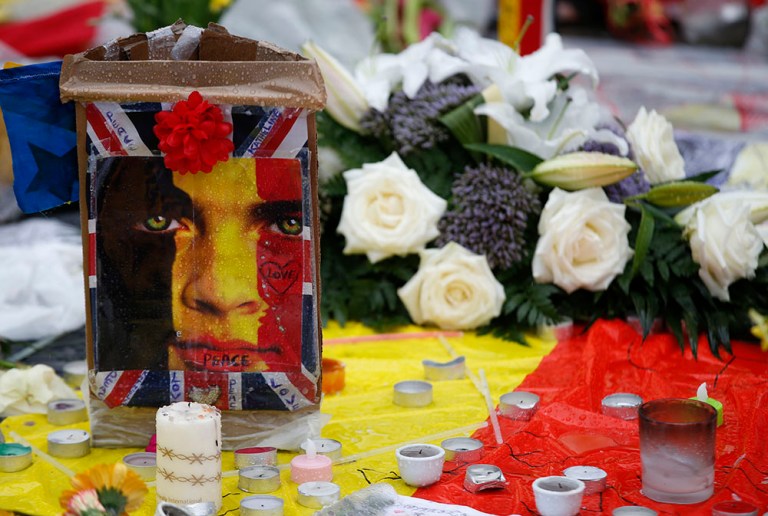 We are at war, but as long as we call it otherwise and act with befuddled surprise with each added atrocity, we can be lulled into thinking that love and understanding can cure this plague. (AP Photo/Alastair Grant)