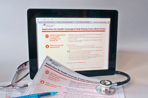 Though the Obama administration has been touting an accelerated pace of individuals signing up for plans under the national health care law, it still remains an open question how many of these individuals actually completed the enrollment process by paying their first month's premiums. (Photo: Thinkstock)