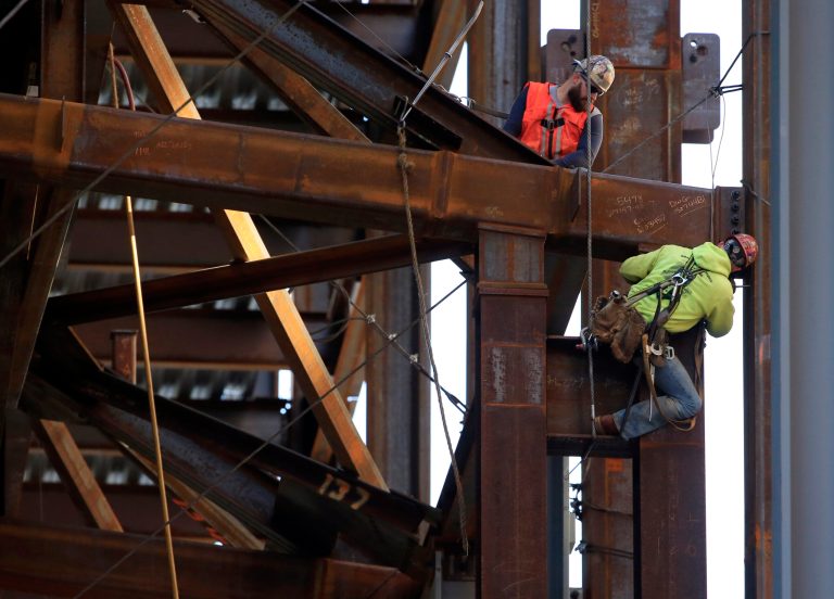 The Commerce Department issues the first of three estimates of how the U.S. economy performed in the July-September quarter on Thursday. (AP Photo/Matt Rourke, File)