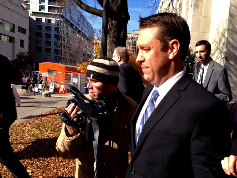 This photo taken with a cellphone shows Rep. Henry 