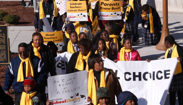 A 1-percentage point increase in the share of students enrolled in private schools would result in about a 1.3 percent gain in lifetime earnings for the average student in a given nation. (AP Photo/Hal Yeager)