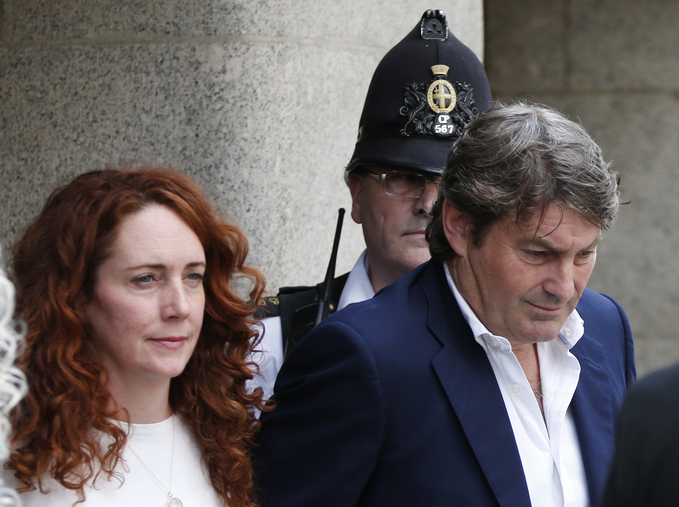 One editor convicted, one cleared in UK scandal