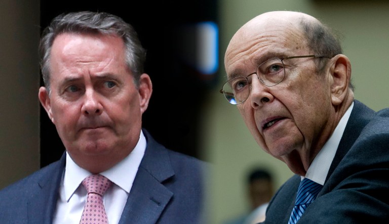 Liam Fox and Wilbur Ross are seen.
