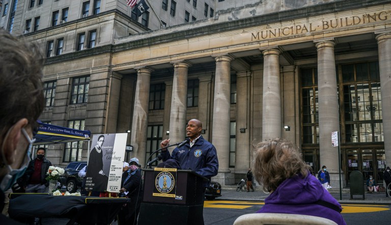 Brooklyn Borough President Eric Adams, center, speaks during a public remembrance to honor the life and legacy of U.S. Supreme Court Justice and former Brooklynite Ruth Bader Ginsburg, outside Brooklynâs, Municipal Building, Sunday Sept. 20, 2020, in New York. Adams is calling on Mayor Bill de Blasio to rename the Municipal Building in honor of Justice Ginsburg, a Brooklynite who passed away Friday at the age of 87.
