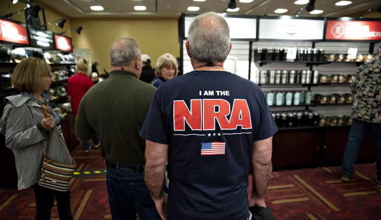 Attendees browse merchandise ahead of the National Rifle Association (NRA) annual meeting at the Indiana Convention Center in Indianapolis, Indiana U.S., on Thursday, April 25, 2019.