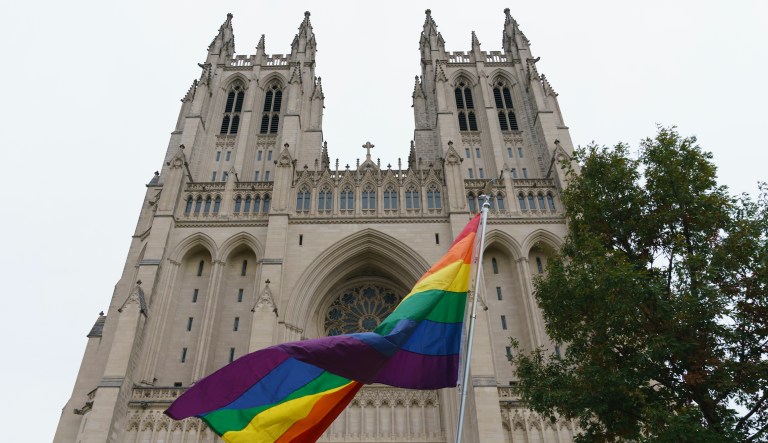 A Gay Pride flag flies outside the Washington National Cathedral in Washington, Friday, Oct. 26, 2018, following a "Thanksgiving and Remembrance of Matthew Shepard" service. The ashes of Matthew Shepard, whose brutal murder in the 1990s became a rallying cry for the gay rights movement, will be laid to rest in Washington National Cathedral.