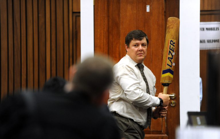 Pistorius trial: Bullet-holed toilet door in court