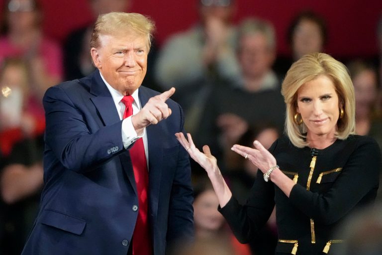 Republican presidential candidate former President Donald Trump and moderator Laura Ingraham on stage during a Fox News Channel town hall Tuesday, Feb. 20, 2024, in Greenville, S.C. (AP Photo/Chris Carlson)