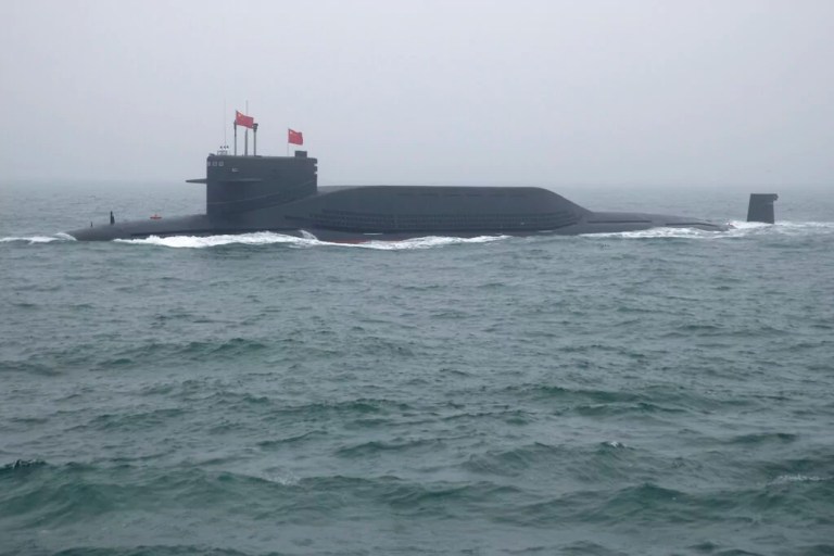 A type 094 Jin-class nuclear submarine Long March 15 of the Chinese People's Liberation Army (PLA) Navy participates in a naval parade to commemorate the 70th anniversary of the founding of China's PLA Navy in the sea near Qingdao in eastern China's Shandong province, Tuesday, April 23, 2019. (AP Photo/Mark Schiefelbein, Pool)
