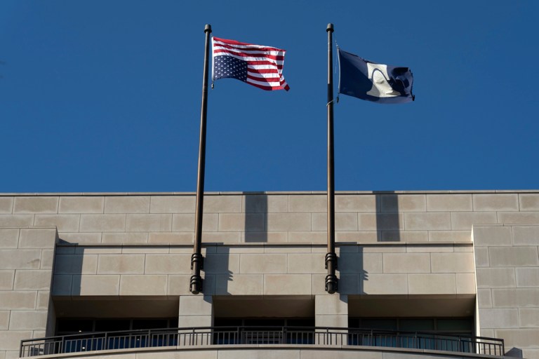 An American flag is seen upside down at the conservative Heritage Foundation in Washington, Friday, May 31, 2024. (AP Photo/Jose Luis Magana)