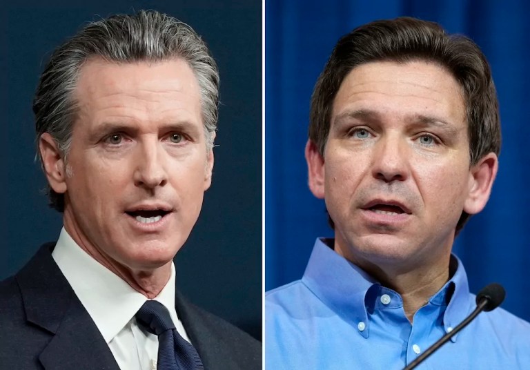 This combination of photos shows California Gov. Gavin Newsom (D) speaking in Sacramento, California, on June 24, 2022, left, and Florida Gov. Ron DeSantis (R) speaking in Sioux Center, Iowa, May 13, 2023, right.