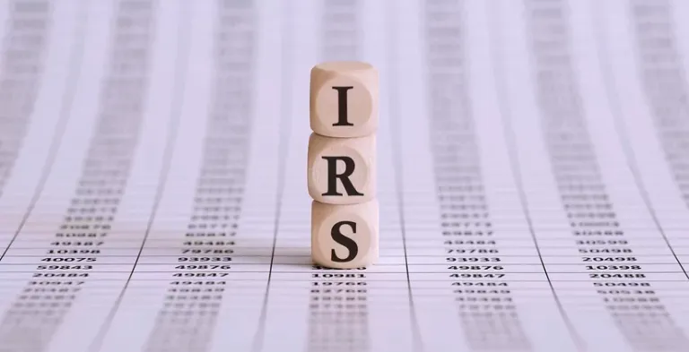 IRS word on a wooden cubes on chart background