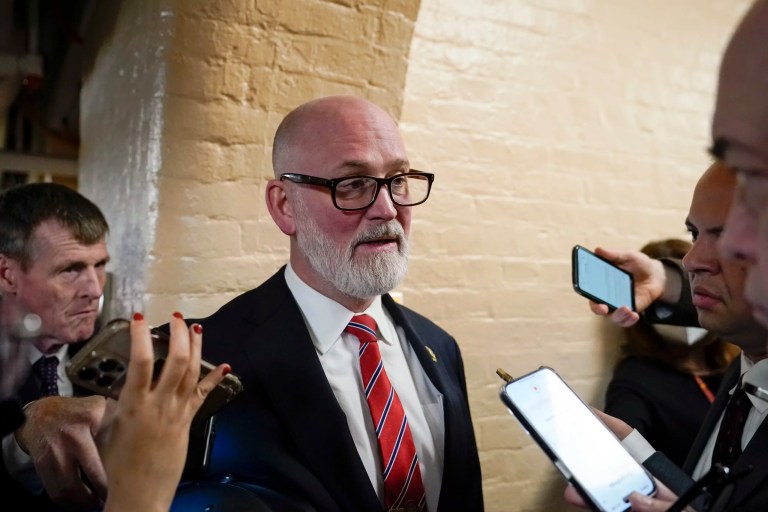 Rep. Derrick Van Orden (D-WI) speaks with reporters as he arrives for the Republican caucus meeting at the Capitol in Washington, Thursday, Oct. 19, 2023.
