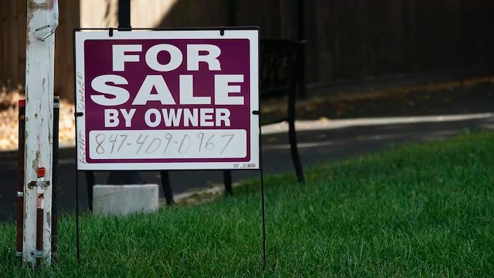 For sale by owner sign is displayed in Northbrook, Illinois