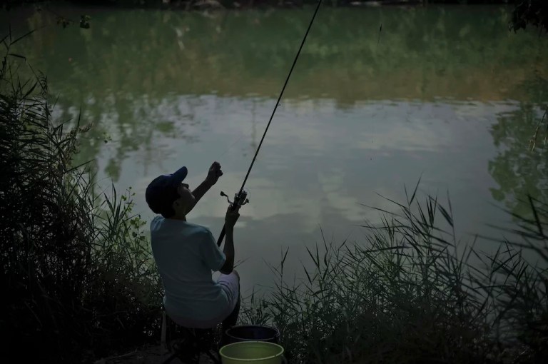 Wisconsin ends ban on carrying firearms while fishing