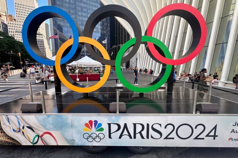 French sports minister takes a dip in the Seine ahead of Paris Olympics