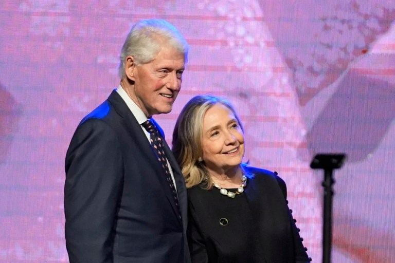 Former President Bill Clinton, left, and former Secretary of State Hillary Clinton listen as Vice President Kamala Harris delivers a eulogy for U.S. Rep. Sheila Jackson Lee, Thursday, Aug. 1, 2024, in Houston. (AP Photo/LM Otero)
