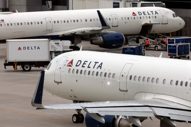 FILE - A Delta Airlines plane leaves the gate on July 12, 2021, at Logan International Airport in Boston. (AP Photo/Michael Dwyer, File)