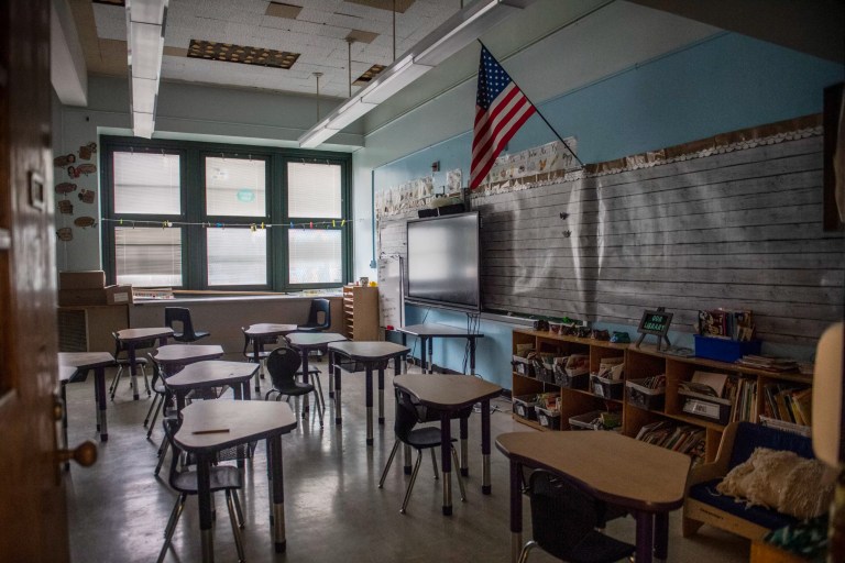 FILE - An empty elementary school classroom is seen, Tuesday, Aug. 17, 2021, in the Bronx borough of New York City. Nationwide, students have been absent at record rates since schools reopened after COVID-19-forced closures. More than a quarter of students missed at least 10% of the 2021-22 school year. (AP Photo/Brittainy Newman, File)