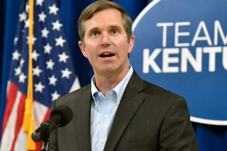 Gov. Andy Beshear (D-KY) speaks to a group gathered to celebrate the signing of an executive order banning the use of “conversion therapy” on minors.