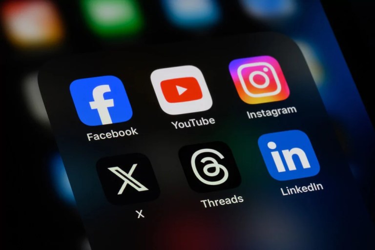 Toronto, Canada - September 24, 2023: Popular social networking apps on an Apple iPhone: X (formerly Twitter) and Threads.