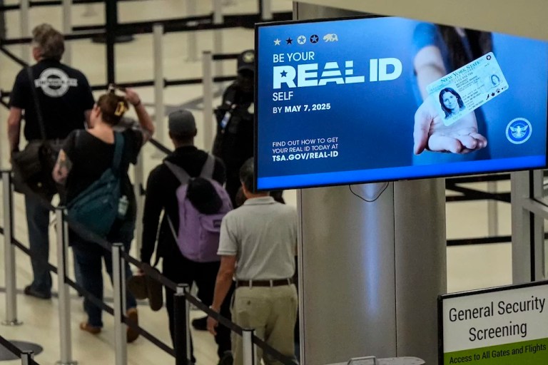 Travelers move through Hartsfield-Jackson Atlanta International Airport.