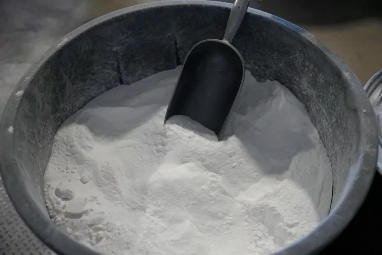 A container of lithium carbonate sits in a shipping warhouse at Albemarle Corp.'s Silver Peak lithium facility, Thursday, Oct. 6, 2022, in Silver Peak, Nev. The Biden administration on Wednesday, Oct. 19, awarded $2.8 billion in grants to build and expand domestic manufacturing of batteries for electric vehicles in 12 states. A total of 20 companies, including Albemarle Corp., will receive grants for projects to extract and process lithium, graphite and other battery materials, manufacture components and strengthen U.S. supply of critical minerals, officials said. (AP Photo/John Locher)