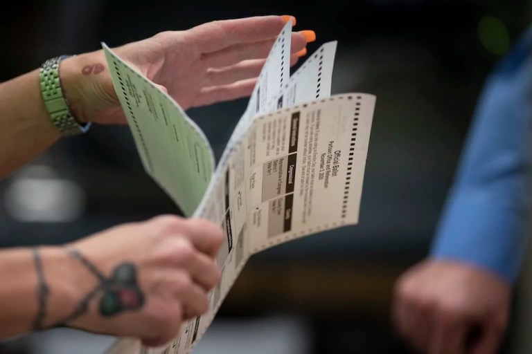 Texas officials search for solutions after voting equipment loses certification