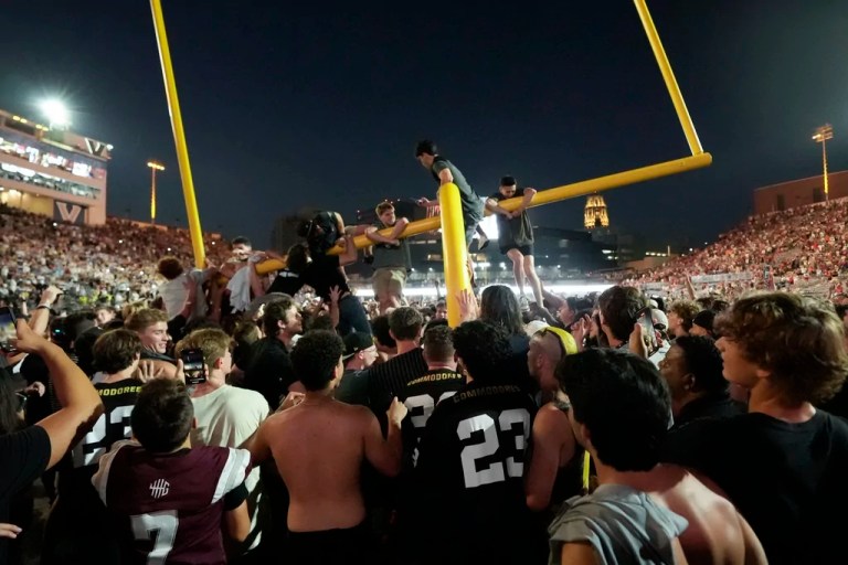 Vanderbilt fans tear down the goal post the after team's 40-35 win over No. 1 Alabama.