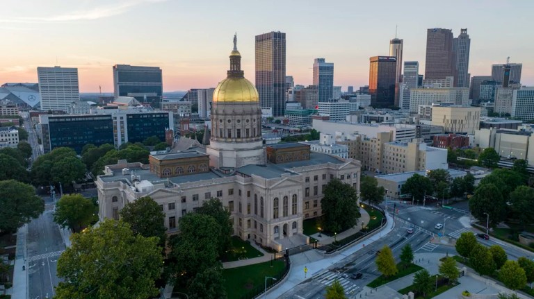 FILE - The gold dome of the Georgia Capitol gleams in the sunlight in Atlanta, Aug. 28, 2022.