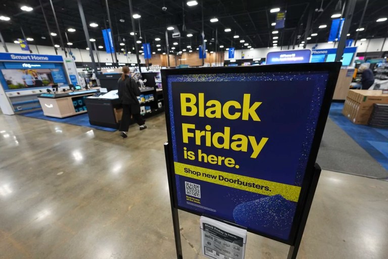 Sign promoting Black Friday deals stands in a Best Buy store Thursday, Nov. 21, 2024, in south Denver. (AP Photo/David Zalubowski)