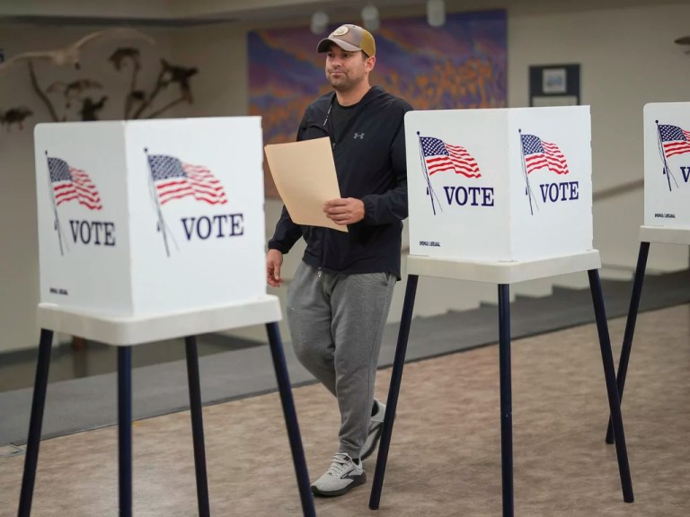 Alexander Johnson of Ames, Iowa, completes his ballot on Election Day, Tuesday, Nov. 5, 2024, at the McFarland Lake Park Conservation Center polling place in Ames.