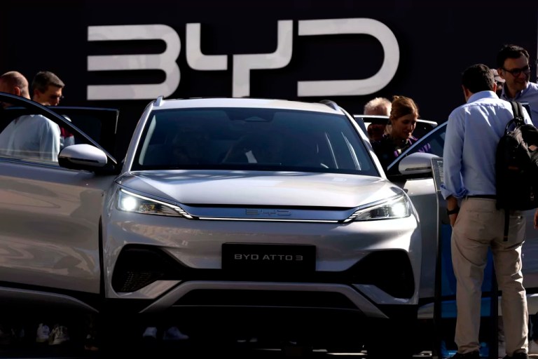 Visitors check the China made BYD ATTO 3 at the IAA motor show in Munich, Germany, on Sept. 8, 2023.