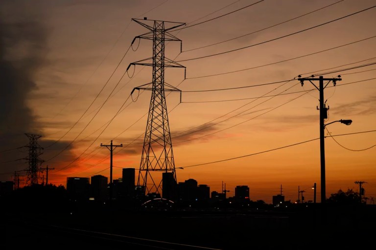 Electrical power lines string across the landscape.