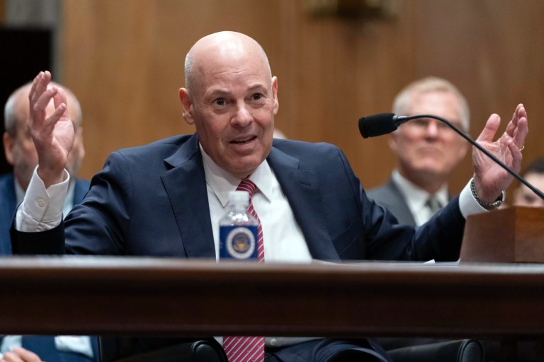 Postmaster general visibly covers his ears amid criticism from GOP lawmaker