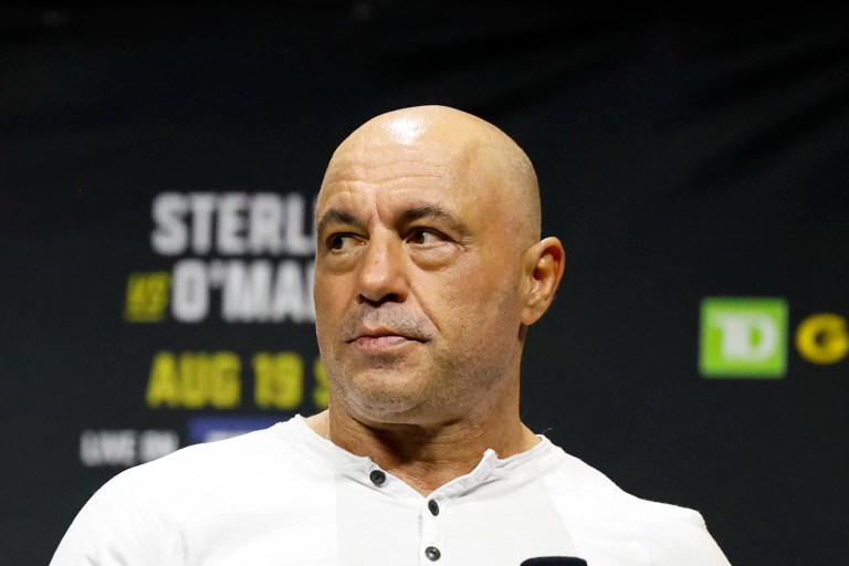 Joe Rogan is seen at the ceremonial weigh-in for the UFC 292 mixed martial arts event, Friday, Aug. 18, 2023, in Boston.