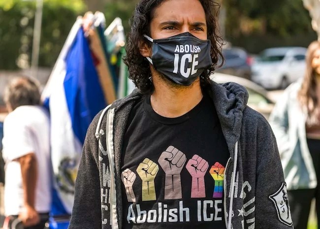 Activist Adam de Monet wears an 