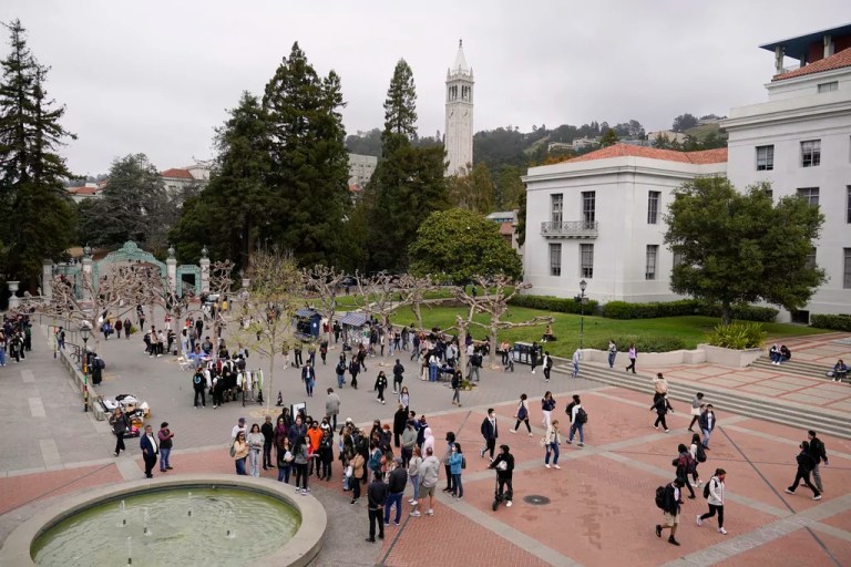 Students make their way through Sproul Plaza on the University of California, Berkeley, campus Tuesday, March 29, 2022. After statewide bans on affirmative action in states from California to Florida, colleges have tried a range of strategies to achieve a diverse student body, such as giving greater preference to low-income families and admitting top students from communities across their states. But after years of experimentation, some states requiring race-neutral policies have seen drops in black and hispanic enrollments.