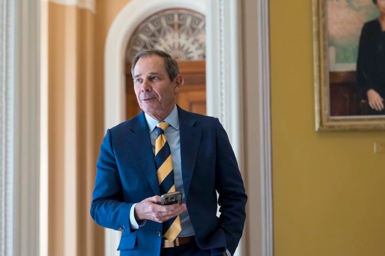 Sen.-elect John Curtis, R-Utah, walks through a corridor before meeting with Senate Minority Leader Mitch McConnell, R-Ky., and other incoming Republicans, at the Capitol in Washington, Tuesday, Nov. 12, 2024. (AP Photo/J. Scott Applewhite)