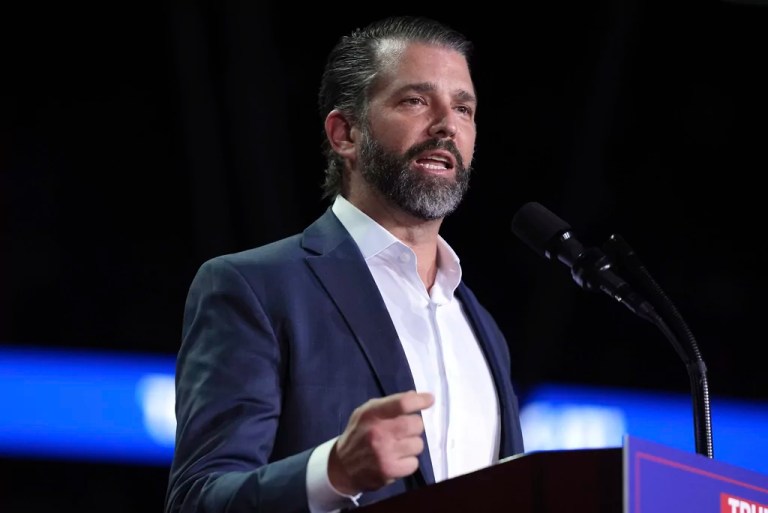Donald Trump Jr. speaks at a podium