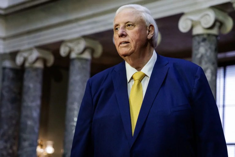 Sen.-elect Jim Justice (R-WV) walks in the old Senate chamber at the Capitol.