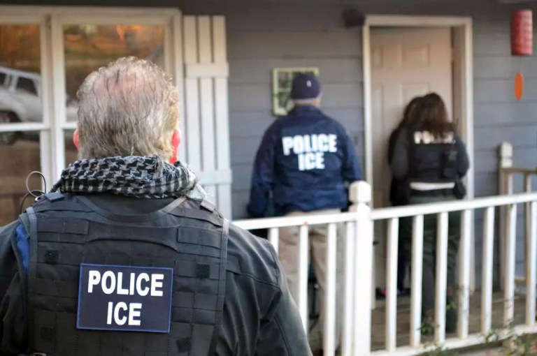 In this Feb. 9, 2017, photo provided Immigration and Customs Enforcement, ICE agents are at a home in Atlanta during a targeted enforcement operation aimed at immigration fugitives, reentrants, and at-large criminal immigrants.
