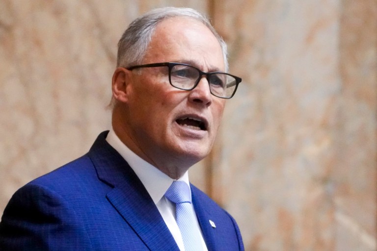 Former Washington Gov. Jay Inslee delivers his annual State of the State address to a joint legislative session in the House chambers of the state Capitol, Jan. 9, 2024, in Olympia.