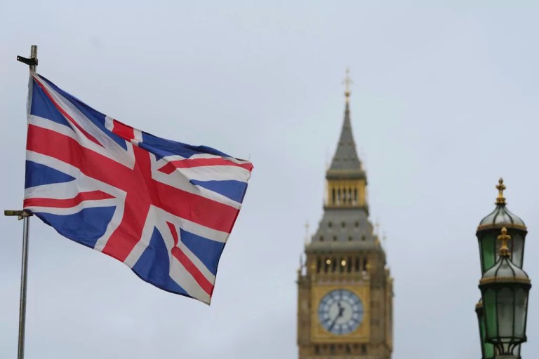 A Union flag flies near Big Ben in London, Friday, Jan. 31, 2025, on the 5th anniversary after the United Kingdom left the European Union. (AP Photo/Kirsty Wigglesworth)