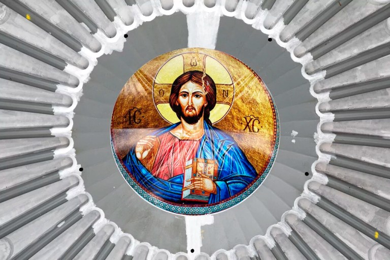 An image of Christ is in place in the ceiling of the St. Nicholas Greek Orthodox Church, Monday, Aug. 3, 2020 at the World Trade Center in New York. The original church was destroyed in the attacks of Sept. 11, 2001. (AP Photo/Mark Lennihan)