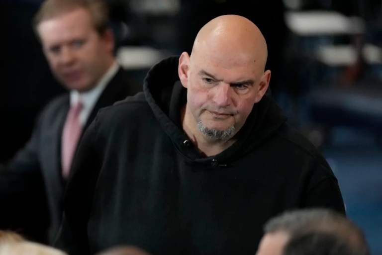 Sen. John Fetterman (D-PA) arrives before the 60th Presidential Inauguration in the Rotunda of the Capitol in Washington.