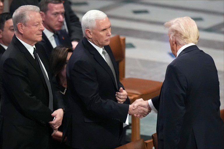 President-elect Donald Trump shakes hands with former Vice President Mike Pence as former Vice President Al gore watches before the state funeral for former President Jimmy Carter at Washington National Cathedral in Washington, Thursday, Jan. 9, 2025.