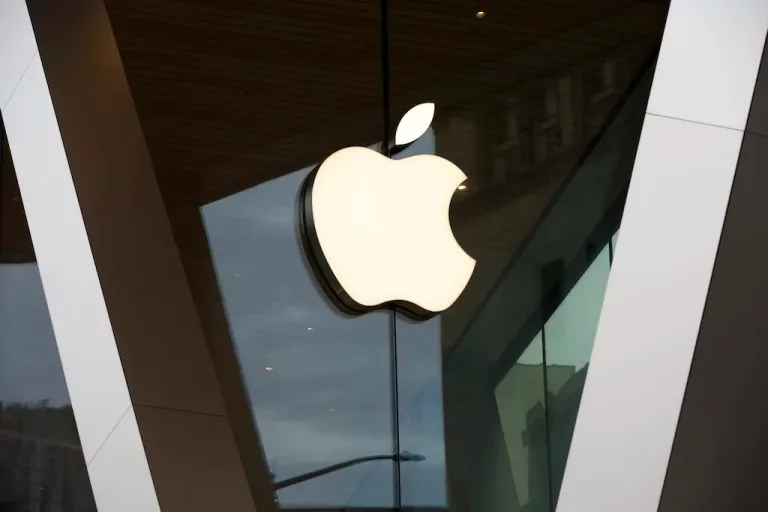 An Apple logo adorns the facade of the downtown Brooklyn Apple store on March 14, 2020, in New York.