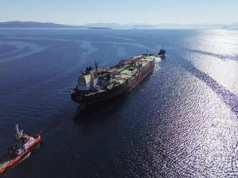 A Greek-flagged oil tanker in the ocean.