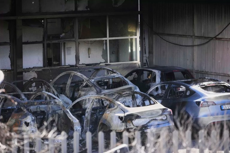 Tesla dealership in Rome loses 17 cars in fire as protests ramp up against Musk